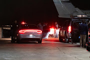 A motorcade carrying Haiti's Prime Minister Ariel Henry leaves the Luis Munoz Marin International Airport in San Juan, Puerto Rico, March 5, 2024.  