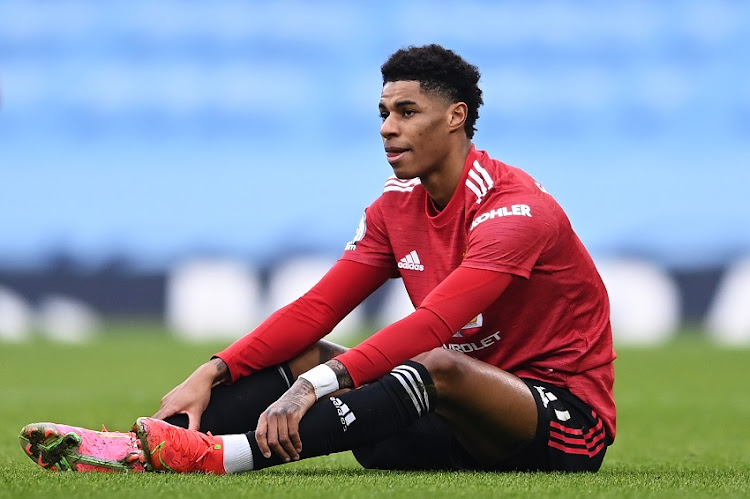 Marcus Rashford of Manchester United reacts as he sits down during the Premier League match between Manchester City and Manchester United at Etihad Stadium on March 07, 2021 in Manchester, England. Sp