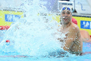 Chad le Clos celebrates winning gold in the men's 100m butterfly at the world short-course championships in Melbourne on Sunday. 