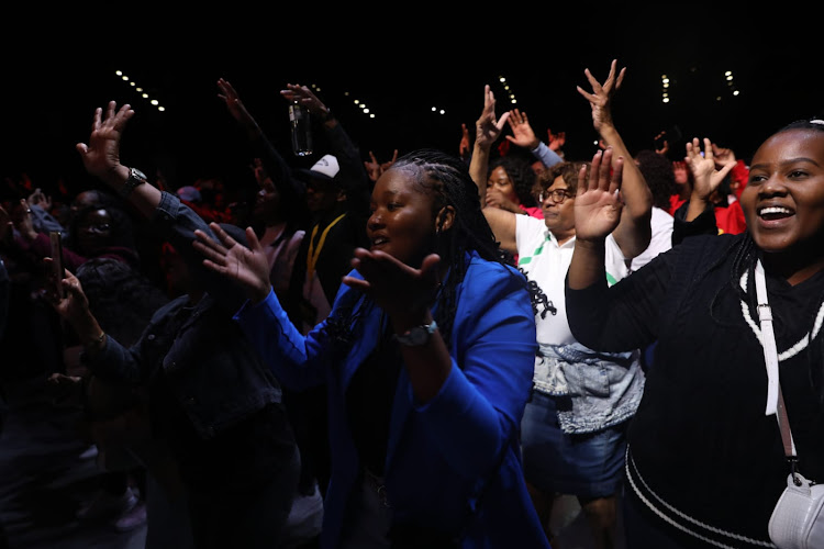 Crowd enjoying at the music at the Rebuilding the Walls concert that was held at the Carnival City Big Top Arena in Brakpan.