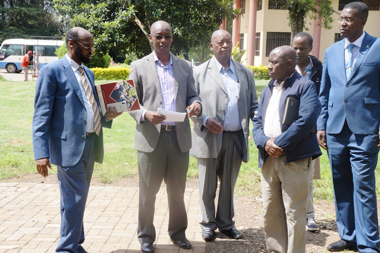 St Paul's University vice chancellor Joseph Galgallo speaking to theology faculty leaders at the site where the building will be put up.