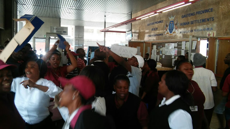 VPS staff protesting inside the Gauteng human settlement offices in the Johannesburg city centre on Thursday morning, January 18, 2018.