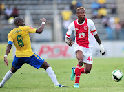 Ajax Cape Town forward Yannick Zakri (R) pulls away from Mamelodi Sundowns captain Hlompho Kekana during a Absa Premiership match at Lucas Moripe Stadium, Rustenburg on April 28 2018. Zakri was on loan at Ajax from Sundowns until the end of the previous season. 