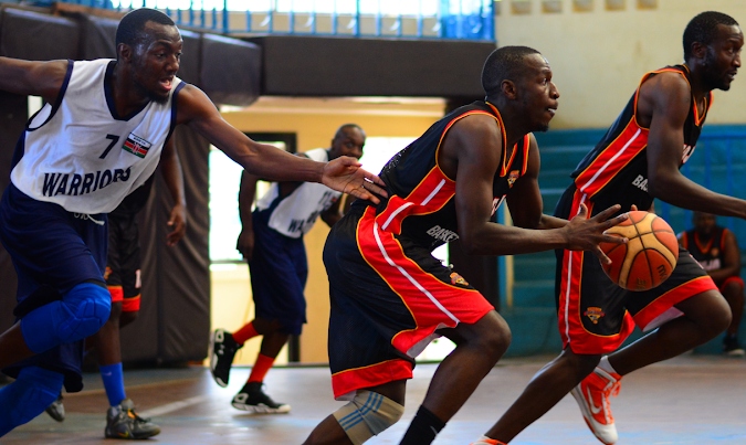 Umoja's Allan Ouma dribbles past James Mwangi of Ulinzi during their recent KBF premier league match at Nyayo Stadium