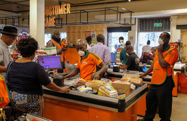 Customers shop for essential commodities inside the Naivas supermarket as residents stock their homes amid concerns about the spread of coronavirus disease (COVID-19) in Nairobi, Kenya March 23, 2020.