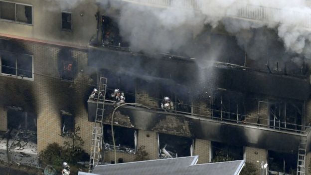 REUTERS Image caption The fire broke out at the three-storey building mid-morning