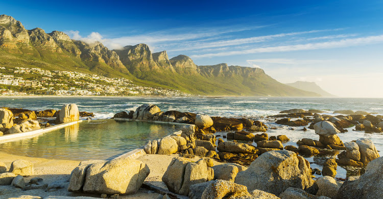 Ocean rock pools at sunset in Camps Bay, Cape Town