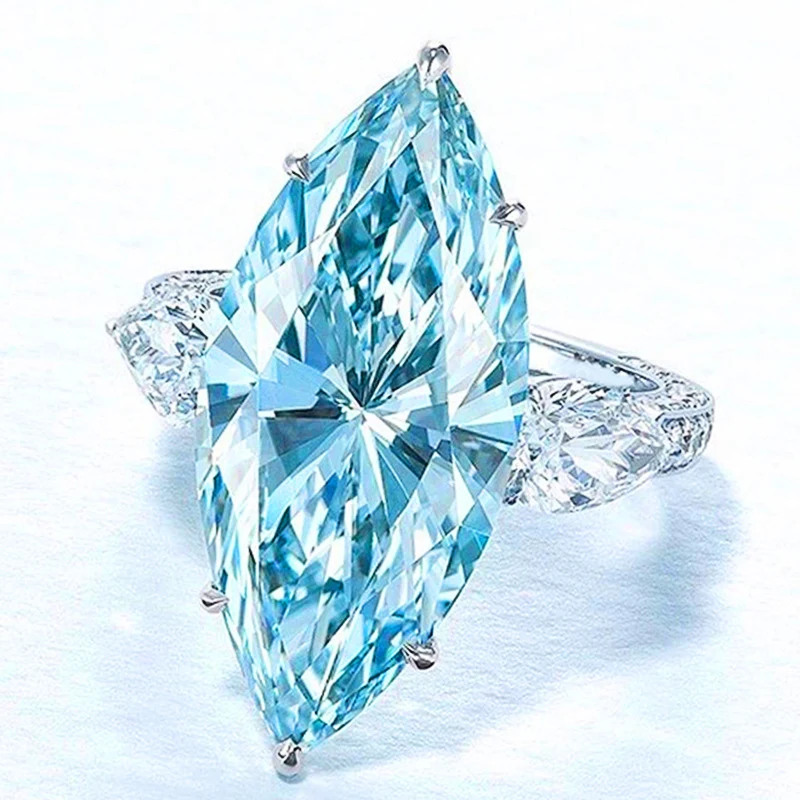 Title 4, Anillo de boda con circonita azul claro en form...