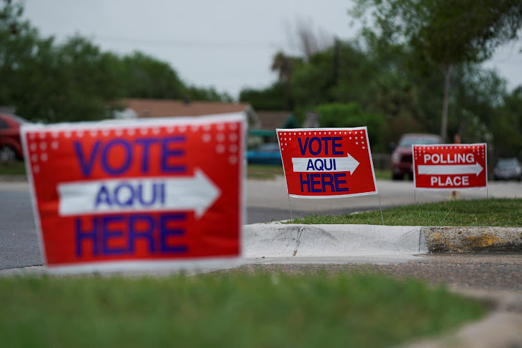 Voting signs are displayed outside a polling site during a special election to fill the vacant 34th congressional district seat in Los Fresnos, Texas, U.S., June 14, 2022.