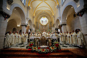 The acting Latin Patriarch of Jerusalem Pierbattista Pizzaballa, leads Christmas morning mass at Saint Catherine's Church, in the Church of the Nativity, in Bethlehem in the Israeli-occupied West Bank, December 25, 2021. 