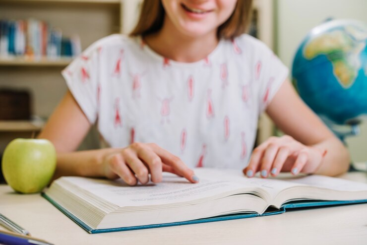 Student engrossed in reading, reflecting on homeschooling's immersive learning.