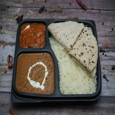 Dal Makhni, Kadhai Paneer, Tawa Roti (4), Rice, Salad & Raita Thali