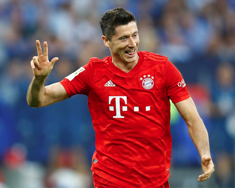 Bayern Munich's Robert Lewandowski celebrates scoring against Schalke 04