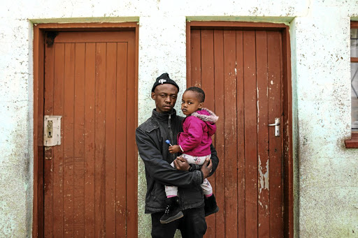 Sanelisiwe Mfaba's brother, Muzi Ngcobo, with her daughter Katlego Mfaba.