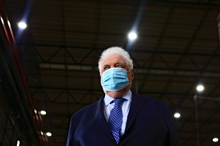 Argentina's Health Minister Gines Gonzalez Garcia looks on during the arrival of 580,000 doses of the Oxford-AstraZeneca coronavirus disease (COVID-19) vaccine at Ezeiza International Airport in Buenos Aires, Argentina, February 17, 2021.