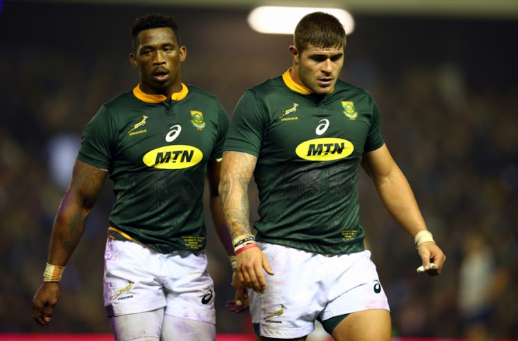 The Springboks captain Siya Kolisi (L) with Malcolm Marx (R) during the Castle Lager Outgoing Tour match between Scotland and South Africa at BT Murrayfield on November 17, 2018 in Edinburgh.
