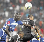 CLOSING DOOR: Orlando Pirates defender Siyabonga Sangweni fights for the ball with SuperSport United striker Mame Niang during their Premiership match at Orlando Stadium in Soweto on Saturday night. Photo Antonio Muchave