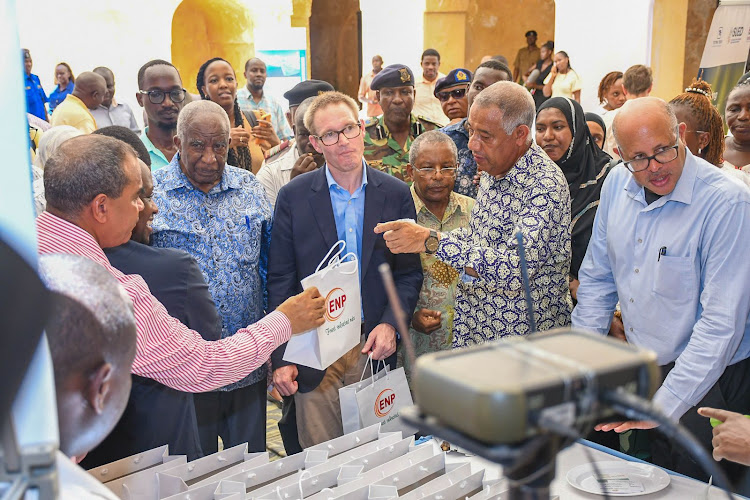 Equatorial Nut Processors chairman Peter Munga, Lamu Governor Issa Timamy and British High Commissioner Neil Wigan during the launch of the construction of the Lamu cashew factory.