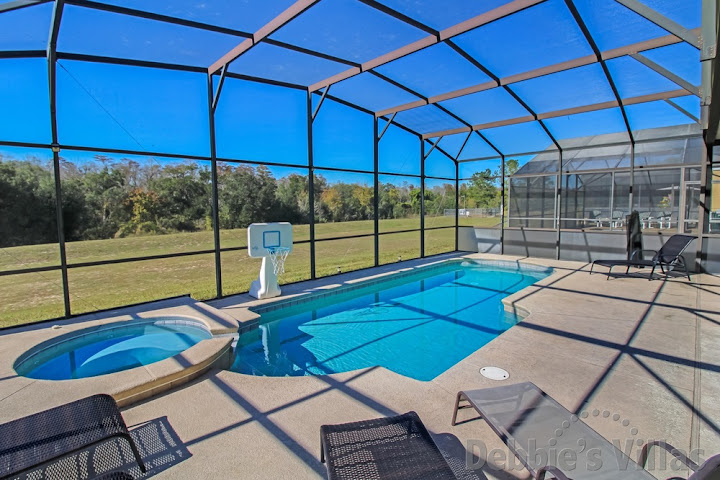 West-facing private pool and spa at this villa on the gated Highgate park in Davenport