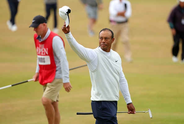 Tiger Woods of the US acknowledges the crowd on the 18th green during Day Two of The 150th Open at St Andrews Old Course on July 15, 2022 in St Andrews, Scotland.