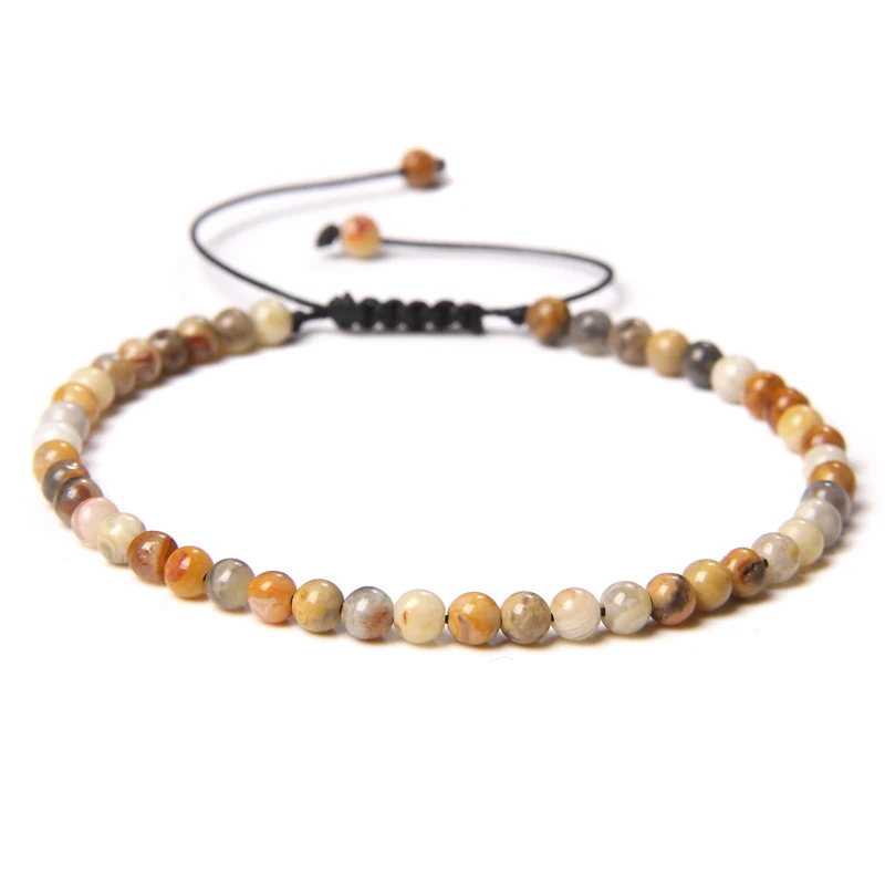 Pulsera de cuentas ajustable con gemas naturales en bruto, creando un estilo único y natural. Disfruta la belleza de la naturaleza en tu muñeca.