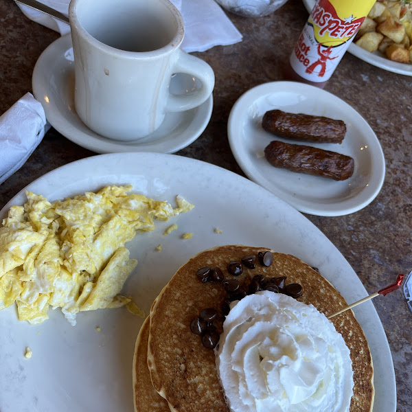 chocolate chip pancakes with eggs and sausage!