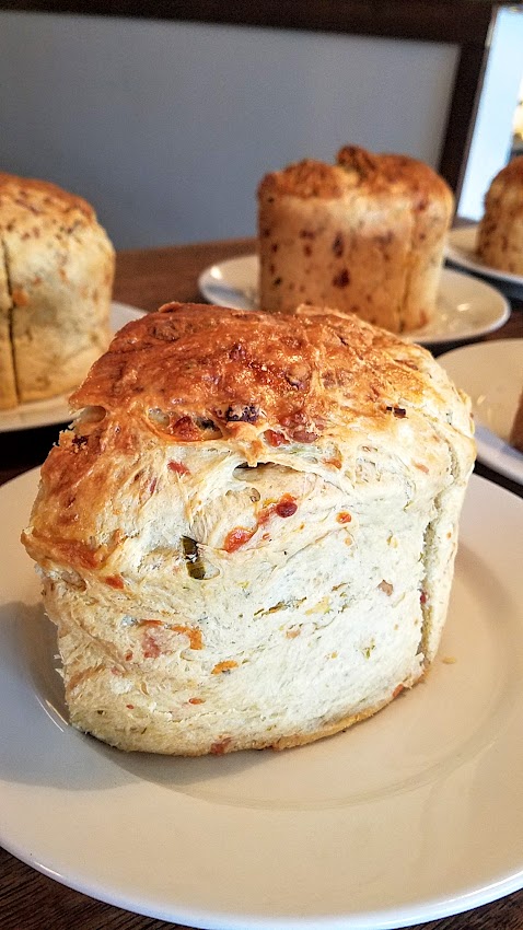 Meadlowlark Portland Dinner No #30 April 22, 2018 All the dinners of this pop up supper club for social justice always benefit a cause and the food and drink emphasize rustic, handcrafted cuisine and local ingredients. Here, for this dinner one of the highlights was the giant loaves of housemade casatiello, a traditional bread studded with cheese and cured meat - pancetta, cacio di roma, and green garlic