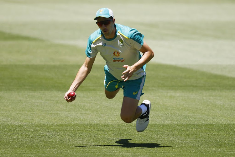 Pat Cummins in action during an Australian Ashes squad nets session at Melbourne Cricket Ground on December 24, 2021 in Melbourne, Australia.