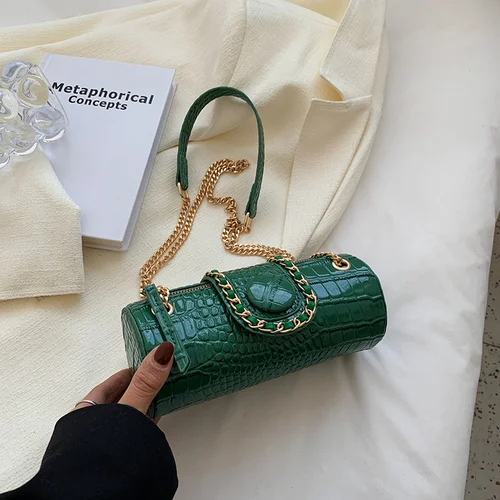 Title 10, Stijlvolle bucket bag van glanzend leer met tre...