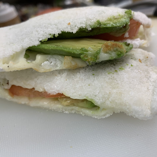 gluten free tapioca crepe with avocado, tomato & cheese.