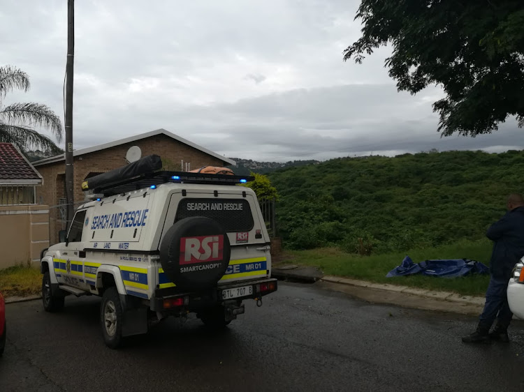 Search and rescue personnel on the scene in Newlands West, Durban, where the body of a man was recovered from dense bush on April 5 2019.