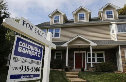 A real estate sign advertising a home for sale in Vienna, Virginia, USA last October. Photo/REUTERS