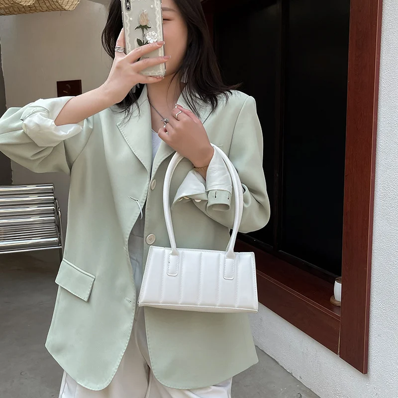 Nouveau sac à bandoulière décontracté de mode printemps, idéal pour le quotidien. Léger, spacieux et stylé pour transporter vos essentiels facilement.
