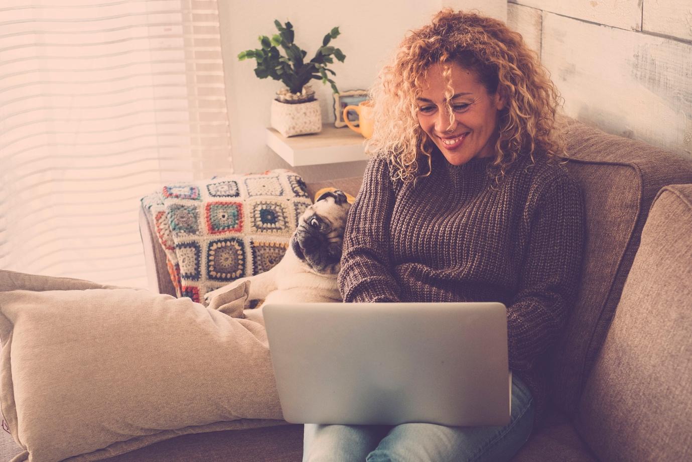 A person sitting on a couchDescription automatically generated