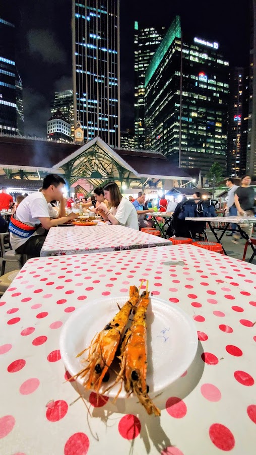 Guide to visiting hawker centers in Singapore- a look at Lau Pa Sat for Satay Street in the evening