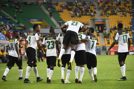 Ghana's players celebrate a goal during the 2017 Africa Cup of Nations group D football match between Ghana and Uganda in Port-Gentil on January 17, 2017.