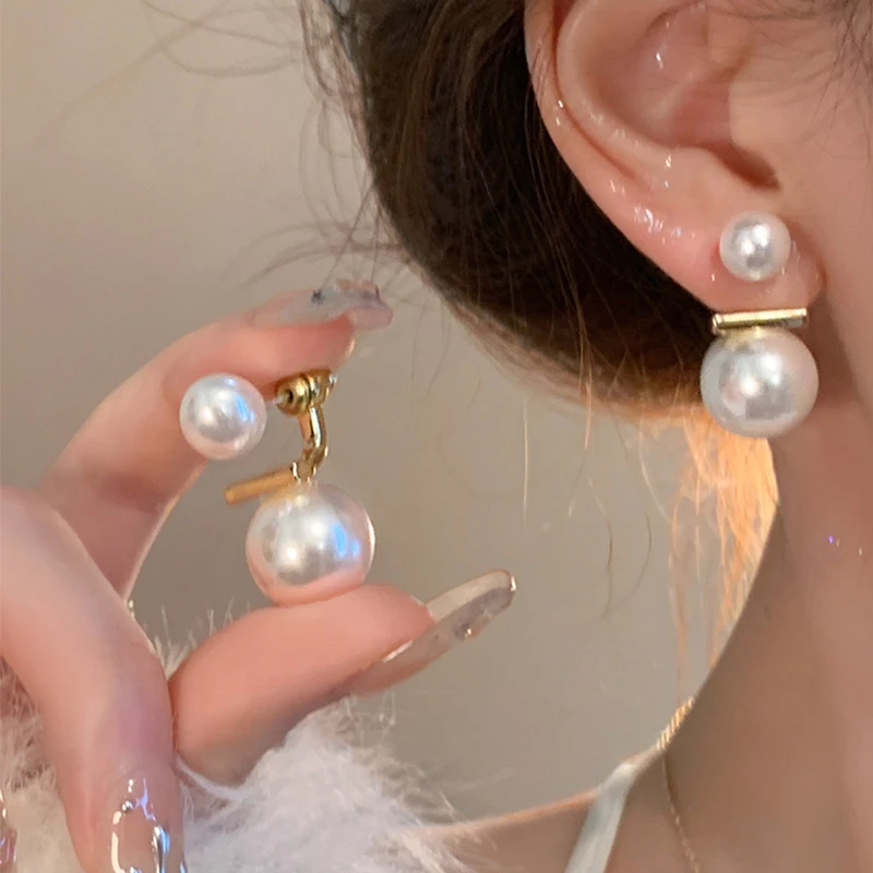 Zilveren naald oorbellen met parels voor dames. Lichtgewicht luxe, subtiele elegantie en een uniek design voor een verfijnde en tijdloze uitstraling.