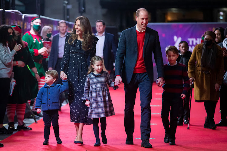 The Duke and Duchess of Cambridge with their children Prince Louis, Princess Charlotte and Prince George. The royal couple released a sweet snap of Louis as the tot turns three.