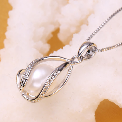 Title 1, Pearl Shell Pearl Cross Punk Pendant