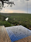 Rain drops plop into the writer's private pool overlooking the valley.