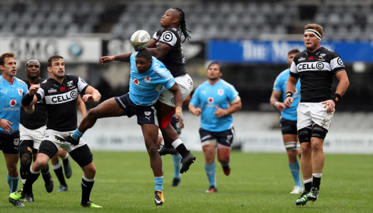 Sibusiso Nkosi of the Cell C Sharks out jumps Warrick Gelant of the Blue Bulls during the Currie Cup match between Cell C Sharks and Vodacom Blue Bulls at Growthpoint Kings Park on September 23, 2017 in Durban.