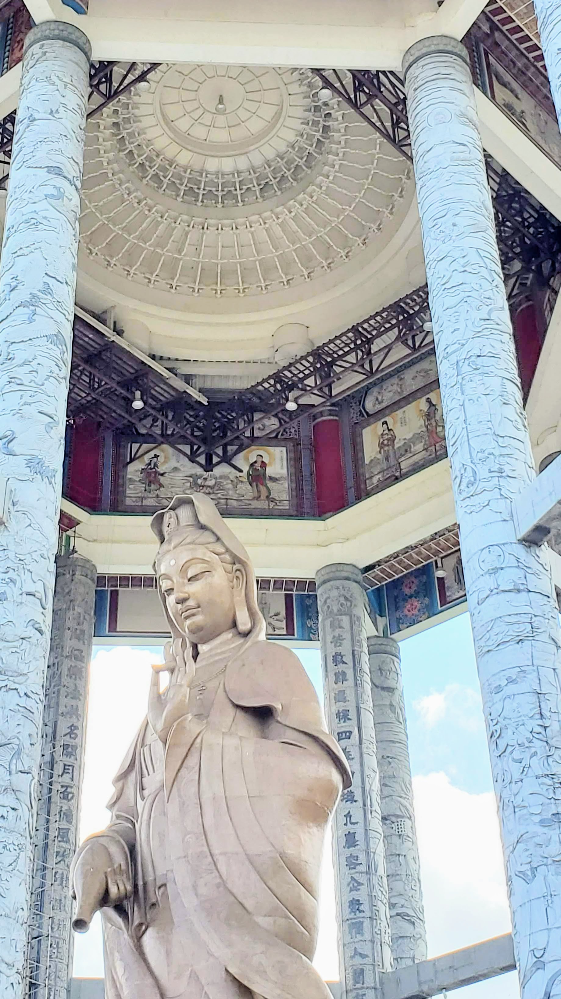 Visiting Kek Lok Si: What makes it unique is that among its millions of Buddhas it shows the blending of cultures that is so representative of Malaysia by including many stylistic representations of Buddha.