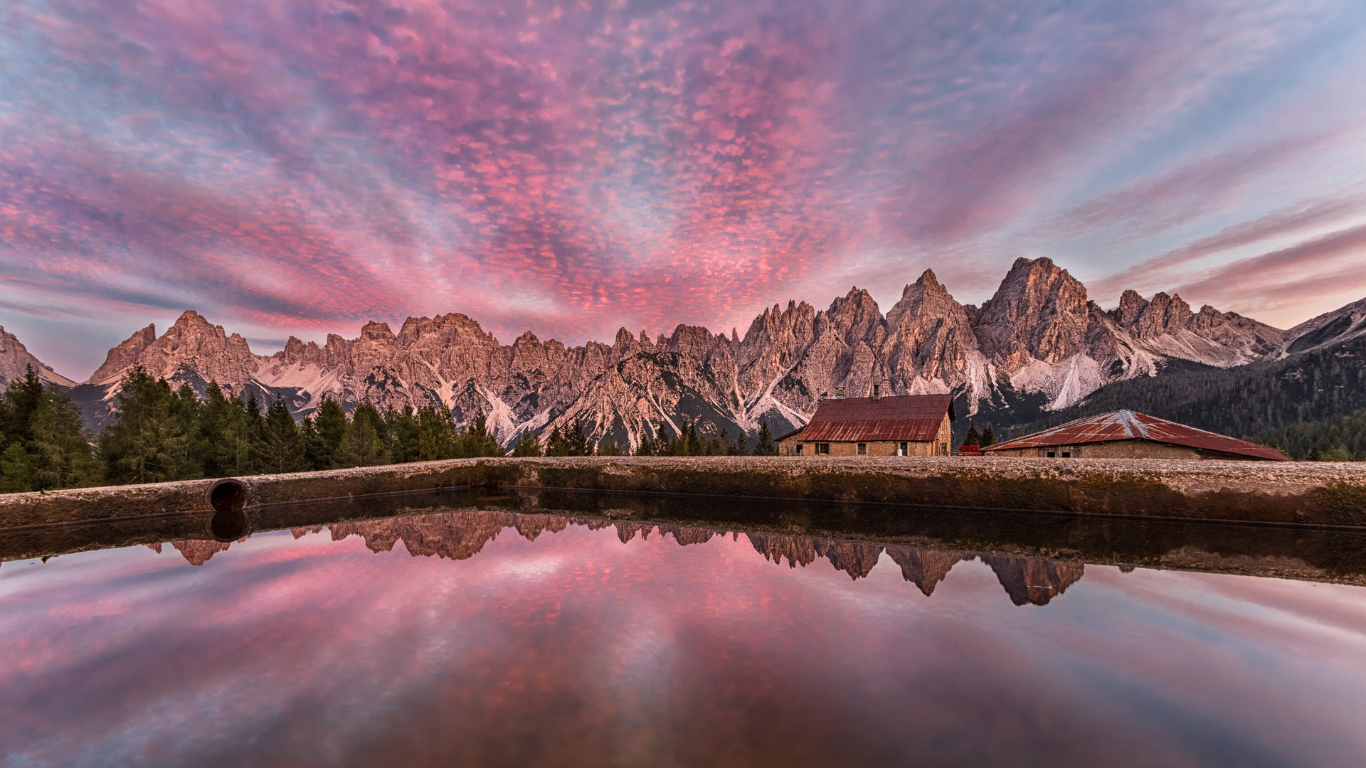 Nuvole riflesse nell'abbeveratoio di casera Vedorcia di Alexa21