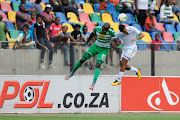 Reeve Frosler of Bidvest Wits and Roggert Nyundu of Celtics during the Absa Premiership match between Bloemfontein Celtic and Bidvest Wits at Dr Molemela Stadium on October 01, 2017 in Bloemfontein, South Africa.