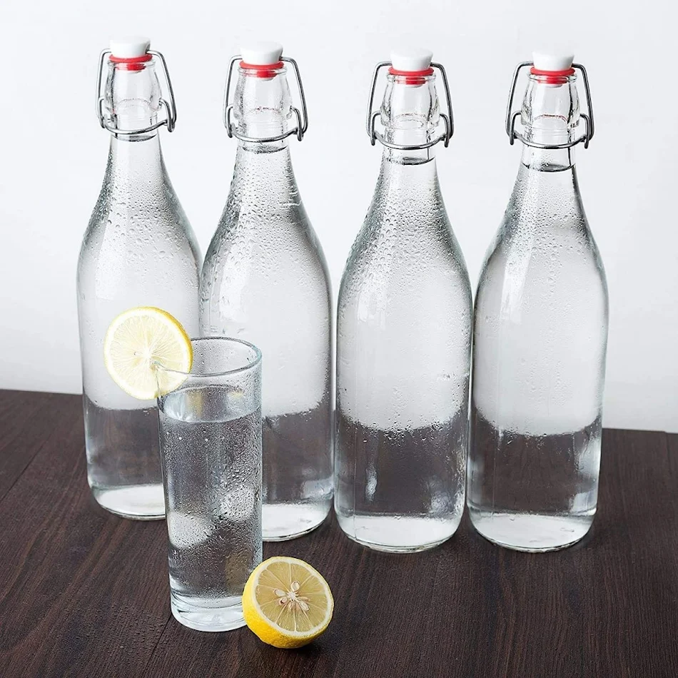 Szklana, przezroczysta, szczelna butelka do przechowywania alkoholi, wina i fermentacji. Idealna do domowych trunków, zachowuje aromat.