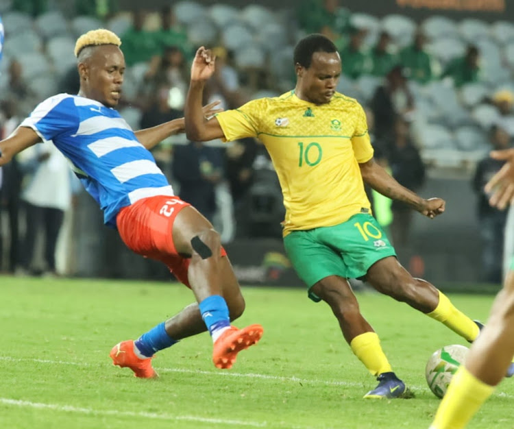 Bafana Bafana's Percy Tau fights for the ball against Liberia's Sampson Dweh during their Africa Cup of Nations qualifiers at Orlando Stadium in Soweto.