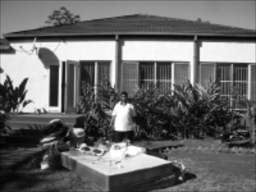 THROWN OUT: Nkhensani Hospital matron Olivia Shivambu has been evicted from a house she bought from the department of public works in 2001. Pic. Victor Hlungwani. 14/08/2008. © Sowetan.