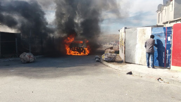 A landfill site was petrol-bombed after an attempted illegal land occupation in Cape Town.