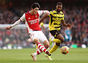 Takehiro Tomiyasu of Arsenal makes a pass during the Premier League match between Arsenal and Watford at Emirates Stadium on November 07, 2021 in London.