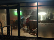 Protesters in Muizenberg petrol bombed a residential area and restaurant on Tuesday evening. 